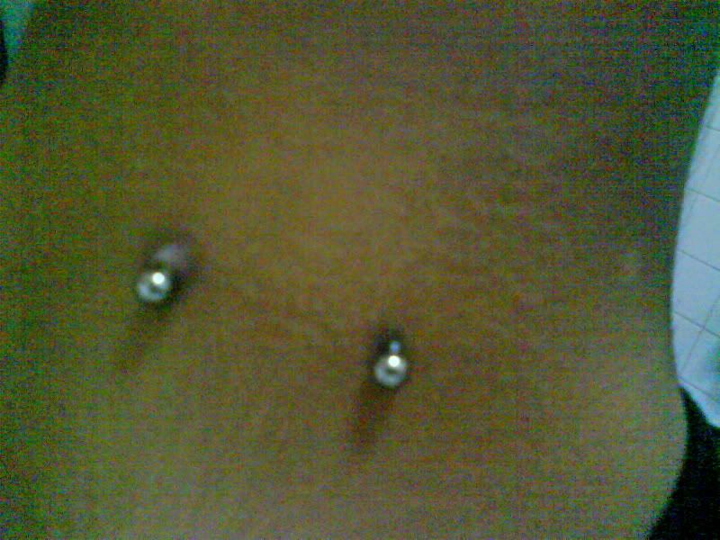 Teen Girl with Piercing Most piercing places won't allow someone under the however, now my piercing has white dead skin on on end of the piercing only.