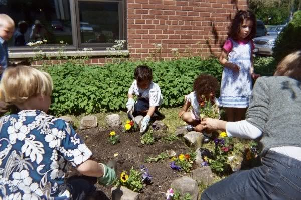 Children Planting Flowers