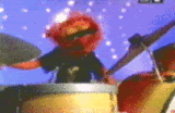 http://i300.photobucket.com/albums/nn27/teatiger/MuppetsTheme/MuppetAnimalPlayingDrums4.gif