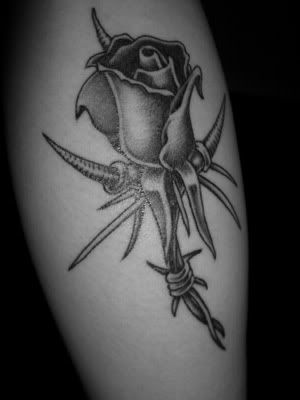 barb-thorn-rose-tattoos.jpg