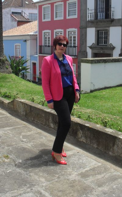 pink blazer black pants