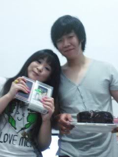 with him, the cake and the gift...